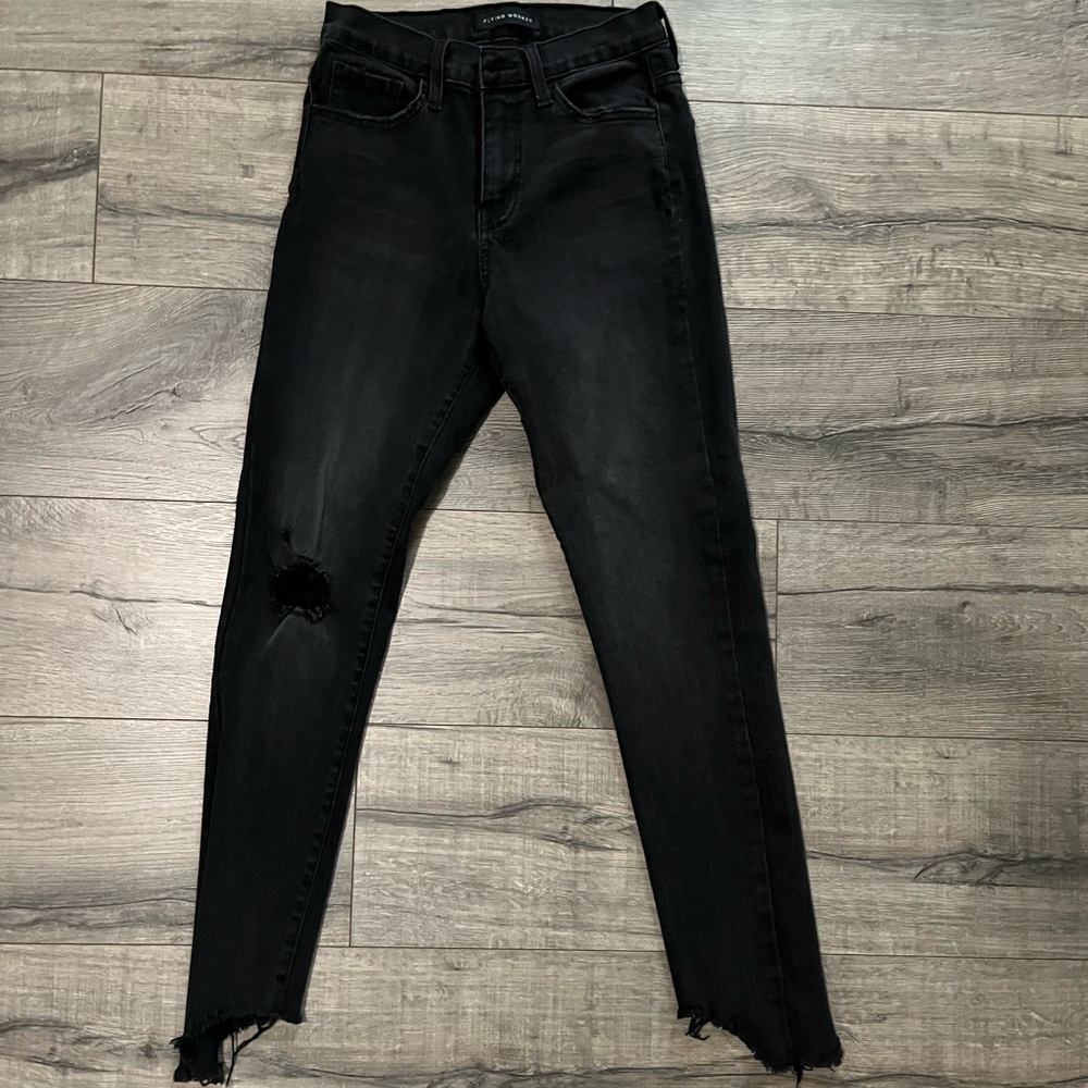 Flying monkey, black, distressed denim jeans.